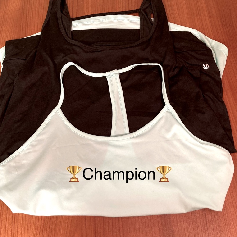 Champion seafoam green and black sports tank tops